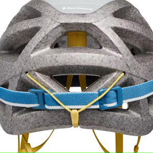 Back view of a grey Black Diamond climbing helmet showing the adjustable blue strap and yellow cord system