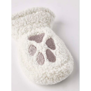 White fuzzy baby mitten with grey embroidered paw print design