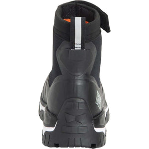 Back view of a black Muck ankle boot with a white pull tab and velcro strap