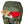Kelty backpack top pocket containing a Field Notes notebook, a map, a flashlight, and a red knit hat