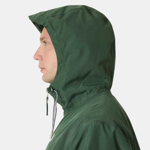 Profile view of a person wearing a dark green hooded jacket