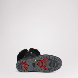 Pajar black winter boot with red and grey traction sole