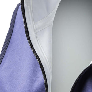 Close up of Gobi Heat jacket interior showing purple fleece lining and white zipper seam