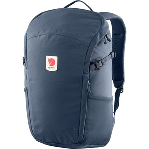 Fjallraven navy blue backpack with front logo patch and side compression straps