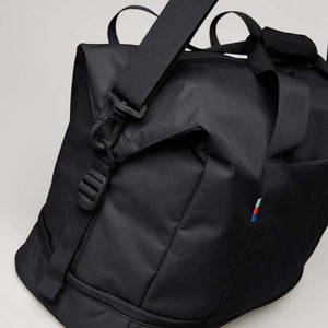 Black Got Bag duffel bag showing the shoulder strap attachment and carry handles