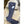 Black neoprene leg sleeve with a small external pocket containing a smartphone resting on a rock
