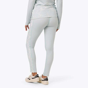 Reebok light blue leggings with side pattern and white sneakers