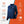 Gobi Heat blue jacket with icons showing temperature, water resistance, washability, and recharge time