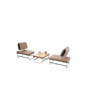 Snow Peak camping table and two chairs set with metal frames and beige cushions
