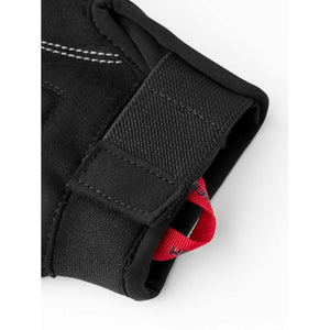 Hestra black glove cuff with velcro strap and red pull tab