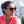 Person wearing Smith Optics tortoise shell sunglasses with brown lenses