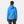 Back view of a woman wearing a blue Helly Hansen hooded rain jacket with black trousers