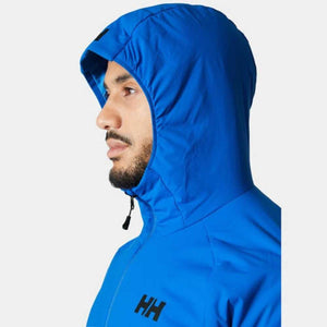 Man wearing a blue Helly Hansen hooded jacket