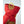 Hestra red insulated mitten cuff with yellow pull loop and brown suede detailing