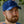 Person wearing a blue Polar Products baseball cap