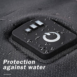 Water droplets on a black power button control panel with three indicator lights