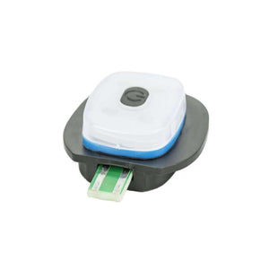 Small square LED bicycle light with a power button and exposed USB charging connector