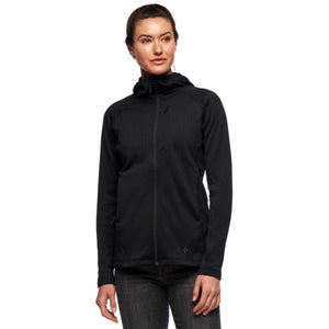 Woman wearing a black Black Diamond hooded fleece jacket