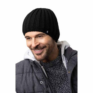Man wearing a black ribbed knit beanie