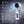 Cianis portable handheld fan with digital display and eight feature icons on a wet concrete background