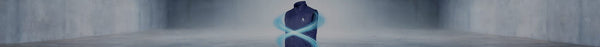 Dark blue performance vest with glowing light blue airflow lines and a white triangular logo, centered in a blurred grey concrete tunnel.