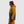 Person wearing an Outdoor Research colorblocked hooded jacket with a Smith beanie and goggles