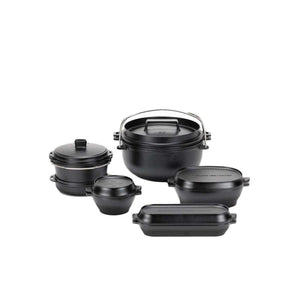 Snow Peak cast iron cookware set including various pots and lids