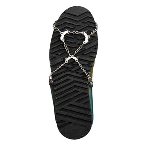 Vaude shoe sole with metal traction chains attached