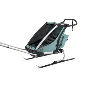Thule Chariot Cross multisport trailer with ski kit attachment in light blue