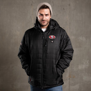 Man wearing a black San Francisco 49ers heated puffer jacket with a beanie