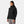 Woman wearing a black Helly Hansen hooded jacket