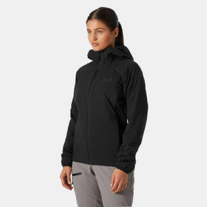 Woman wearing a black Helly Hansen hooded jacket