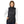 Woman wearing a black Venture Heat quilted vest over a white long sleeve shirt