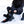 Person wearing black ActionHeat battery heated socks while sitting in the snow