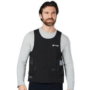 Man wearing a black Venture Heat heated vest over a grey long sleeve shirt
