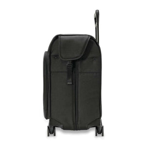 Side view of black Briggs and Riley rolling carry on luggage with extended handle