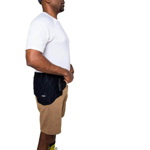 Person wearing a black Onyx hip wrap over brown shorts and a white t-shirt