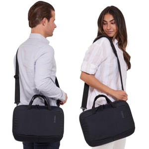 Man and woman carrying black Thule laptop bags with shoulder straps