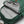 Open green Fjallraven backpack showing interior mesh pocket with keys and storage compartments