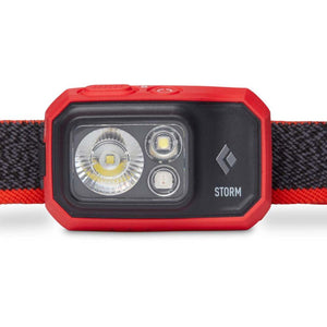 Black Diamond Storm headlamp with red casing and adjustable strap