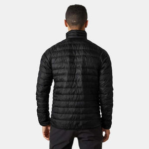 Back view of a person wearing a black Helly Hansen quilted puffer jacket