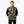 Man wearing a Mobile Warming camouflage print heated vest over a black long sleeve shirt