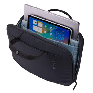Thule black laptop sleeve containing a laptop and tablet