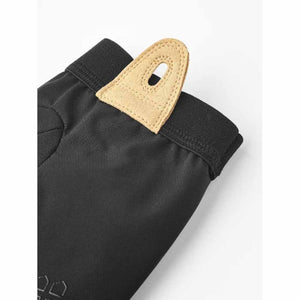 Hestra glove cuff detail with tan leather pull tab