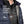 30 Seven heated vest worn under a navy blue jacket featuring ultra thin lightweight and heating technology labels