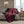 Red and black buffalo plaid electric throw blanket with black sherpa lining on a sofa