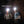 Two hikers wearing BioLite headlamps in a dark cave