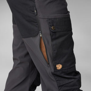 FjallRaven trousers showing side ventilation zipper and cargo pocket with logo patch