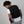 Person wearing a black Oro Sports mesh vest over a white t-shirt