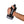 Hand holding a Nathan handheld water bottle with adjustable strap